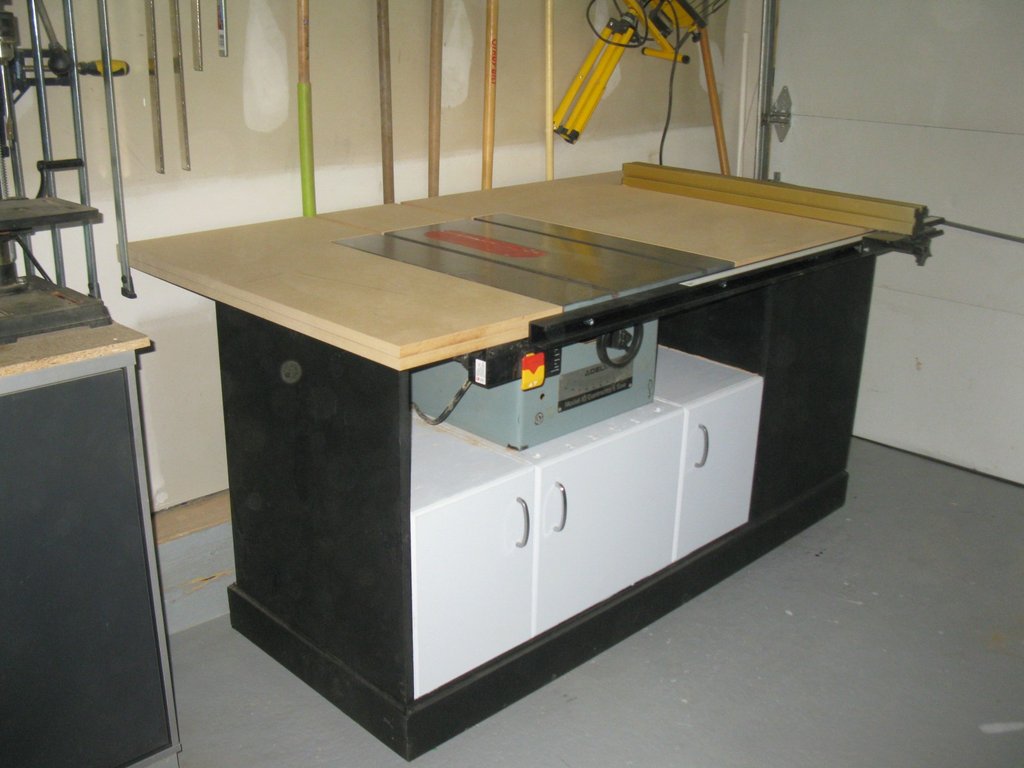 Rusty old table saw turned into a workstation worthy of a master 